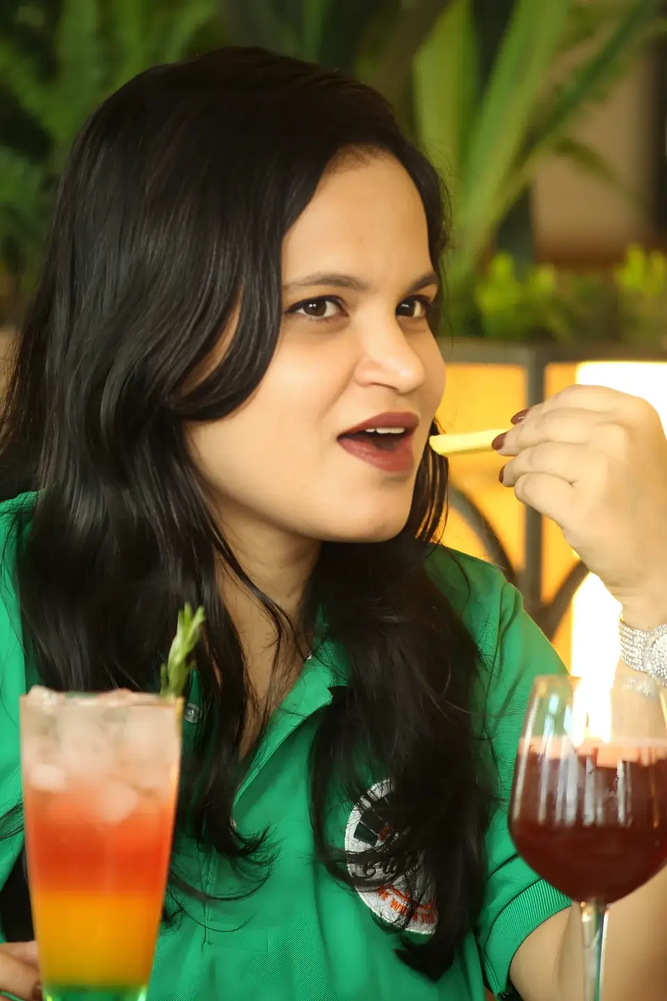 Guest with a layered mocktail