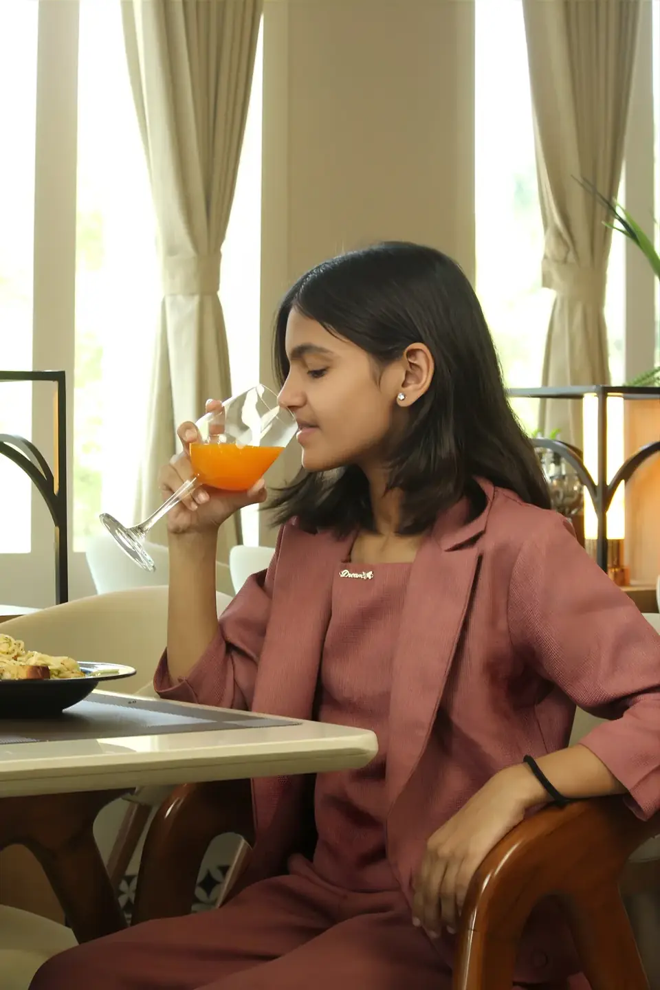 Guest sipping a mocktail