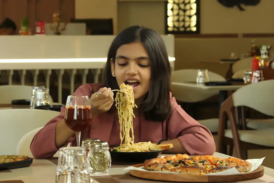 Guest enjoying pasta