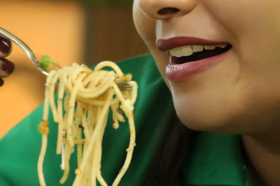 Close-up of spaghetti being enjoyed